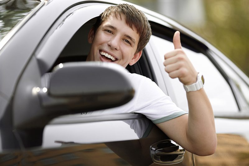 a teen driver in a car
