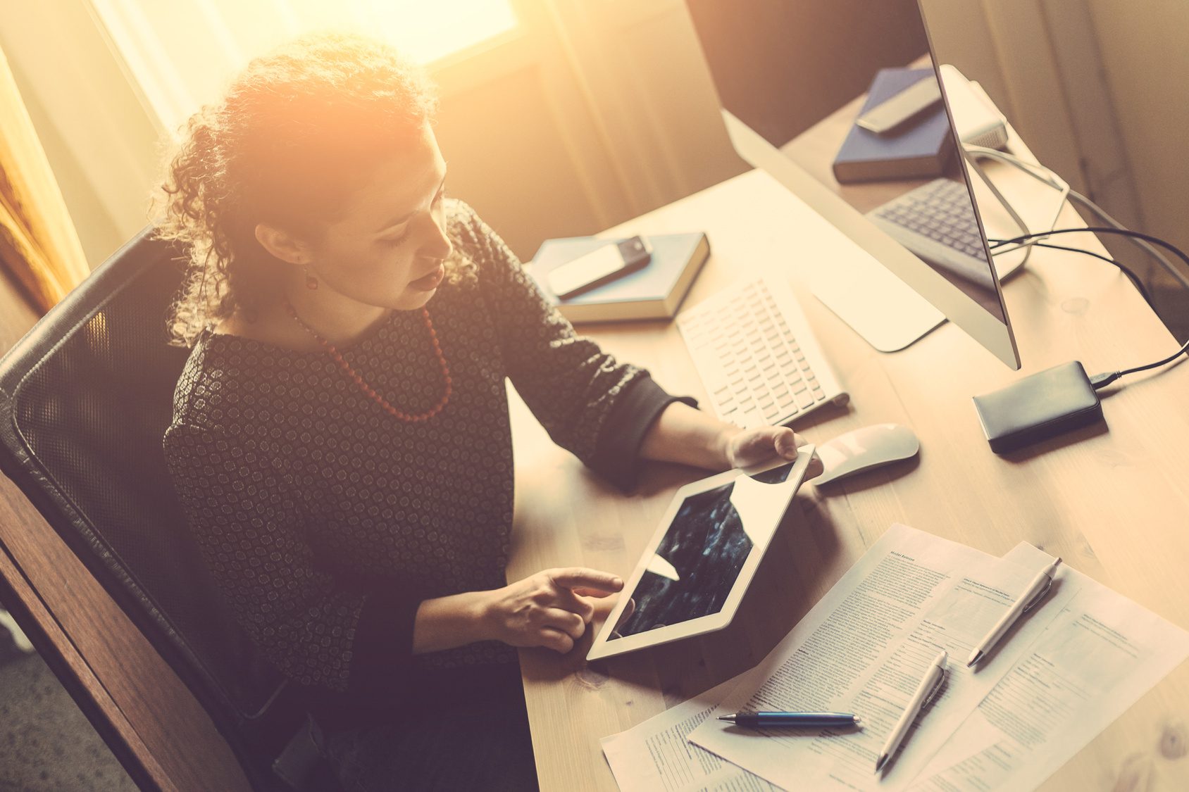 young woman working at a desk