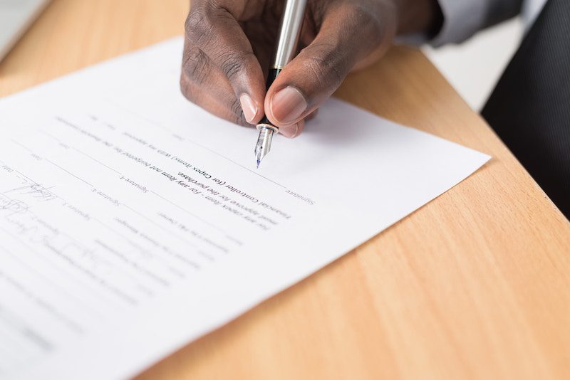 person signing document